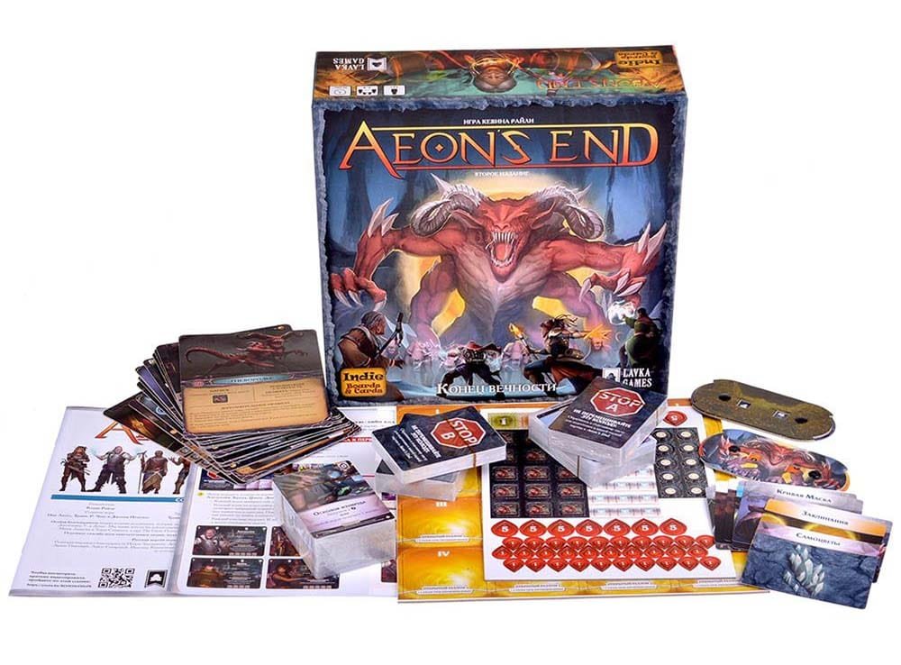 Caja, tableros, cartas y fichas de Aeon’s End preparados para jugar