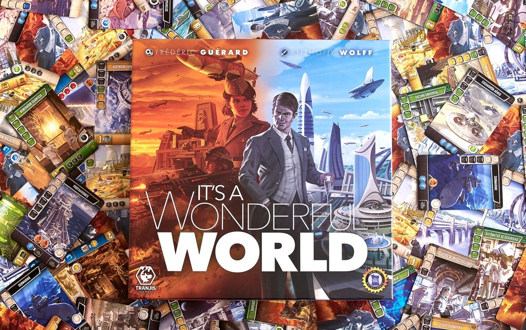 Caja y cartas de It’s a Wonderful World durante una partida